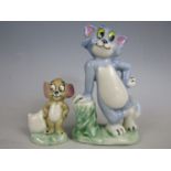 A pair of Wade Tom and Jerry figurines