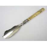 A Victorian silver butter knife with carved bone handle, Birmingham 1872, George Unite