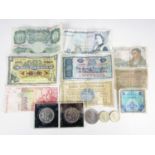 A quantity of Bank of England notes together with three commemorative crowns etc.
