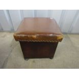 A Victorian leather topped coal box