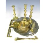 A quantity of brass and electroplate including three brass candlesticks, a brass chamberstick, small