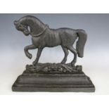 A 19th Century cast iron door stop modelled as a horse, 27 cm