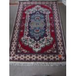 A Modhumita wool rug, 182 x 274 cm