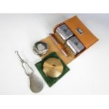 A gentleman's vintage travel brush set, together with two pressed powder compacts and a folding shoe