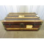 A vintage cabin trunk with LNER luggage labels