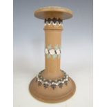 A late 19th Century Doulton Lambeth candlestick