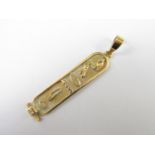 A yellow metal Egyptian cartouche pendant, 3.2g