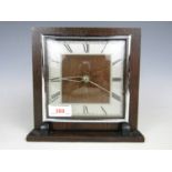 A 1930's - 1940's oak cased mantel clock