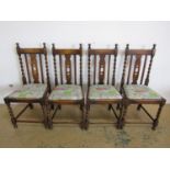 A set of four mahogany dining chairs with pierced back rail