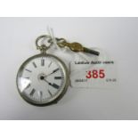 A silver ladies fob watch with key