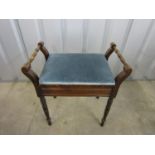 A late 19th / early 20th Century music stool containing sheet music