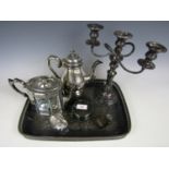 A quantity of electroplate including a tea tray, a teapot, a coffee pot and a candelabrum