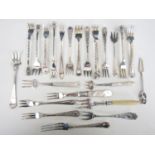 A quantity of electroplate cocktail forks including mother of pearl handles and Scottish thistle