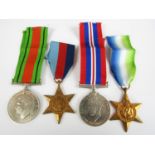 A Great War Medal, a Defence Medal and an Atlantic Star medal together with the 1937 Star medal