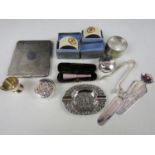 Three various napkin rings together with cased cheroot, two electroplate bookmarks, continental pill
