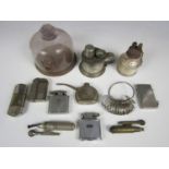 Sundry collectors' items including a watchmaker’s glass dome, a ring gauge and lighters including