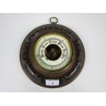 A late 19th Century carved oak barometer (a/f)