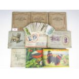 Seven Wills cigarette card albums together with three tea card albums etc.