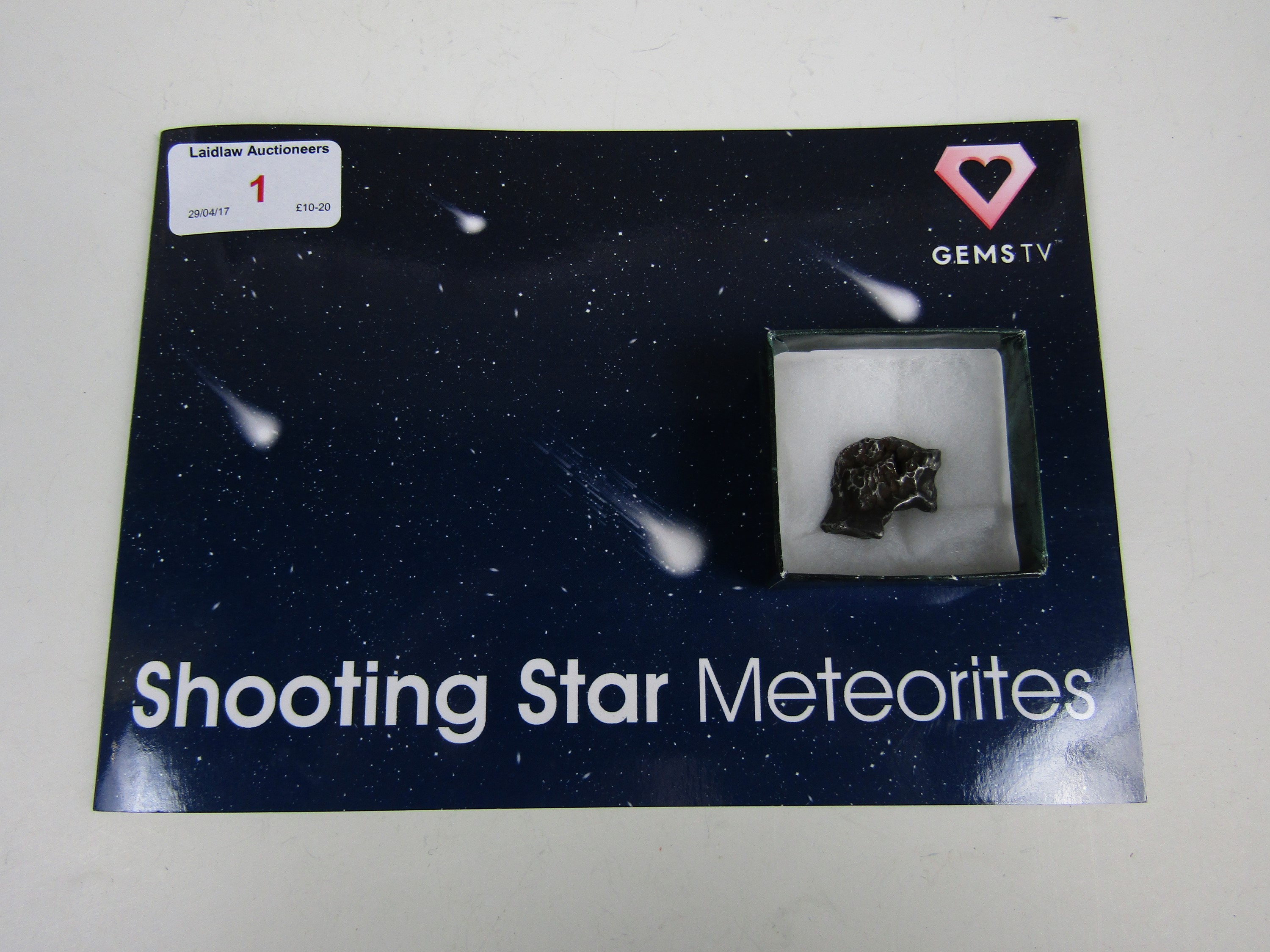 A shooting star meteorite with presentation booklet