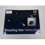 A shooting star meteorite with presentation booklet