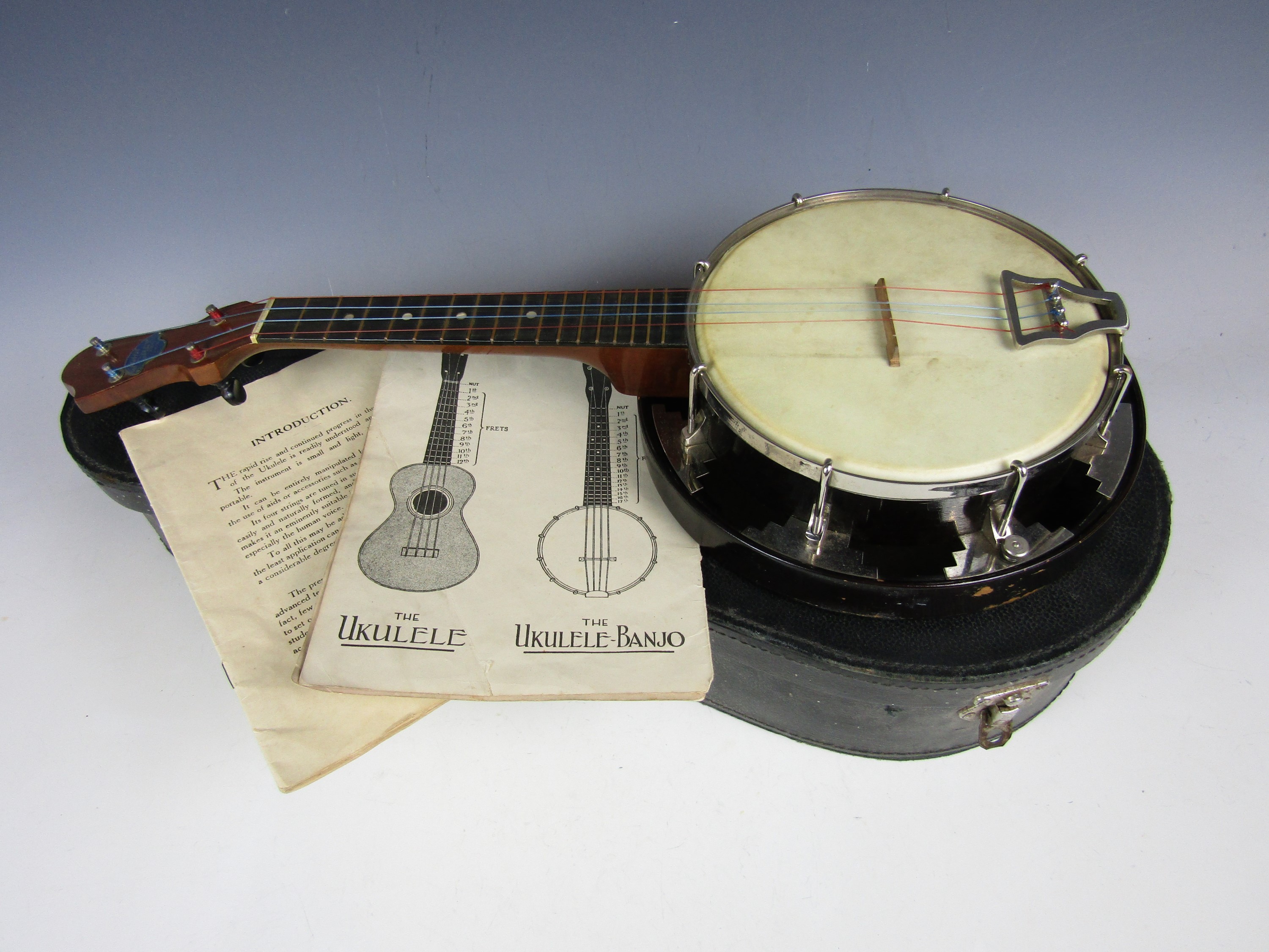 A vintage John Grey & Sons of London ukulele banjo with case