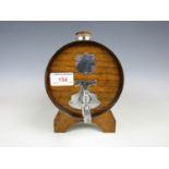 A 1930's electroplate mounted turned oak spirit barrel