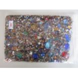 A large quantity of vintage multi-coloured faceted glass and composition beads