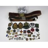 [Girl Guides / Boys Brigade] Vintage belts, together with sundry cloth and lapel badges etc.