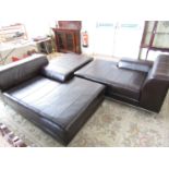 A contemporary three-piece dark brown leather Ikea suite comprising two sofas and a large foot