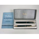 A vintage cased Parker pen set with paperwork