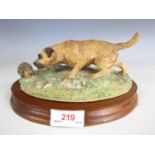 A Border Fine Arts figurine of a Border terrier and a hedgehog 5066