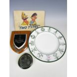 A Coalport Ghurka plate together with a plaque, a paperweight and a cartoon book The Two Types by