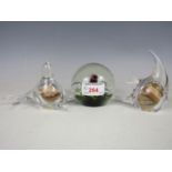 Three glass paperweights