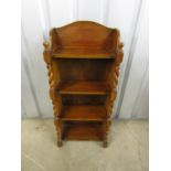 A vintage turned oak four shelf bookcase, 42 x 21 x 100 cm