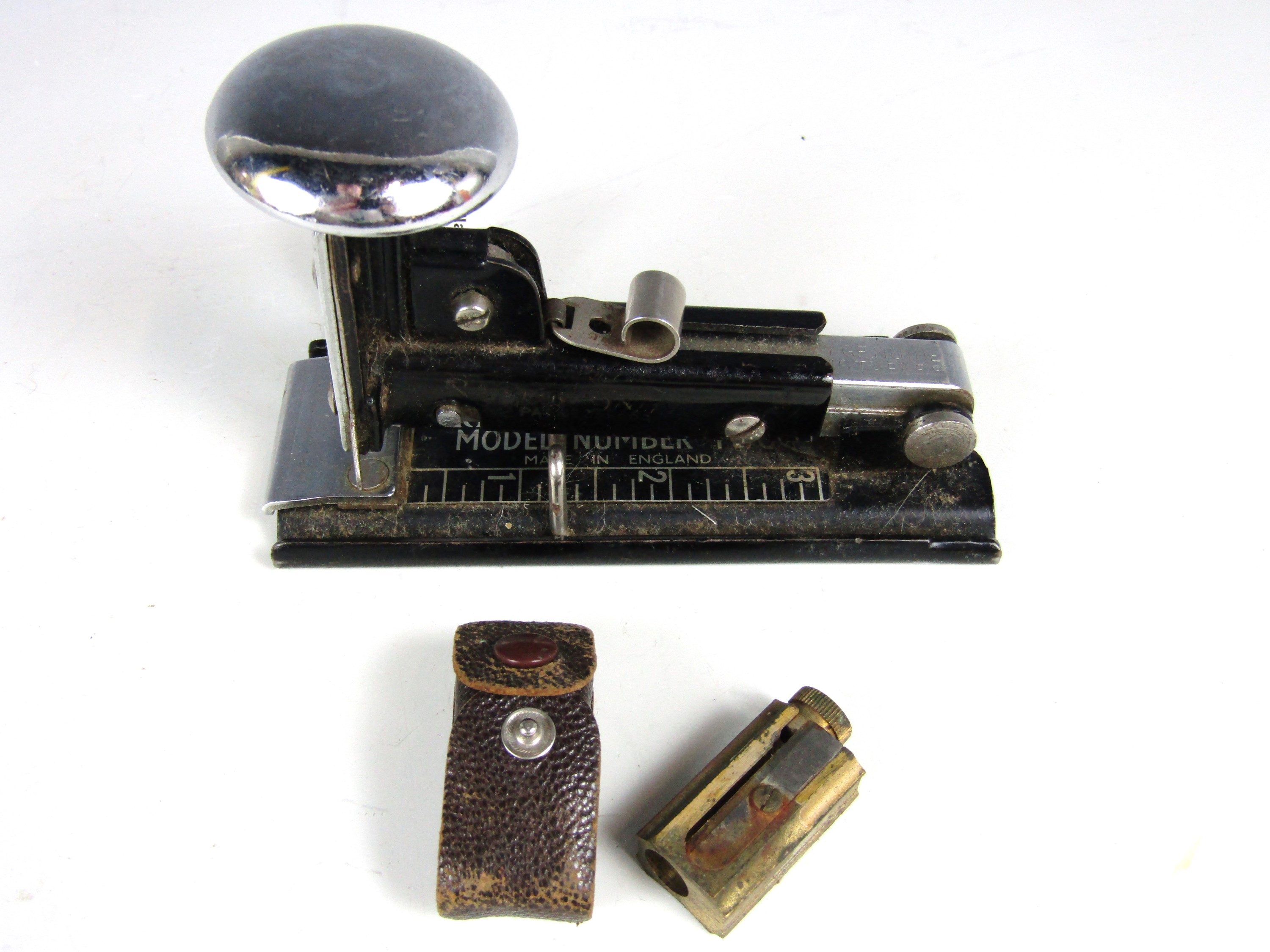 A vintage Brinco stapler together with a Dux adjustable pencil sharpener in its original case