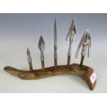 A display of reproduction hand forged medieval arrow heads