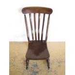 A vintage mahogany rocking chair