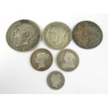 An 1884 Spanish 5 Pesetas silver coin together with sundry others