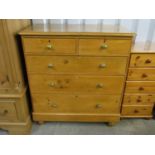 A 19th Century pine chest of two short over three long drawers, 101 x 55 x 110 cm