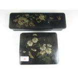 A matching Victorian japanned glove and trinket box set, each hand enamelled with daisies