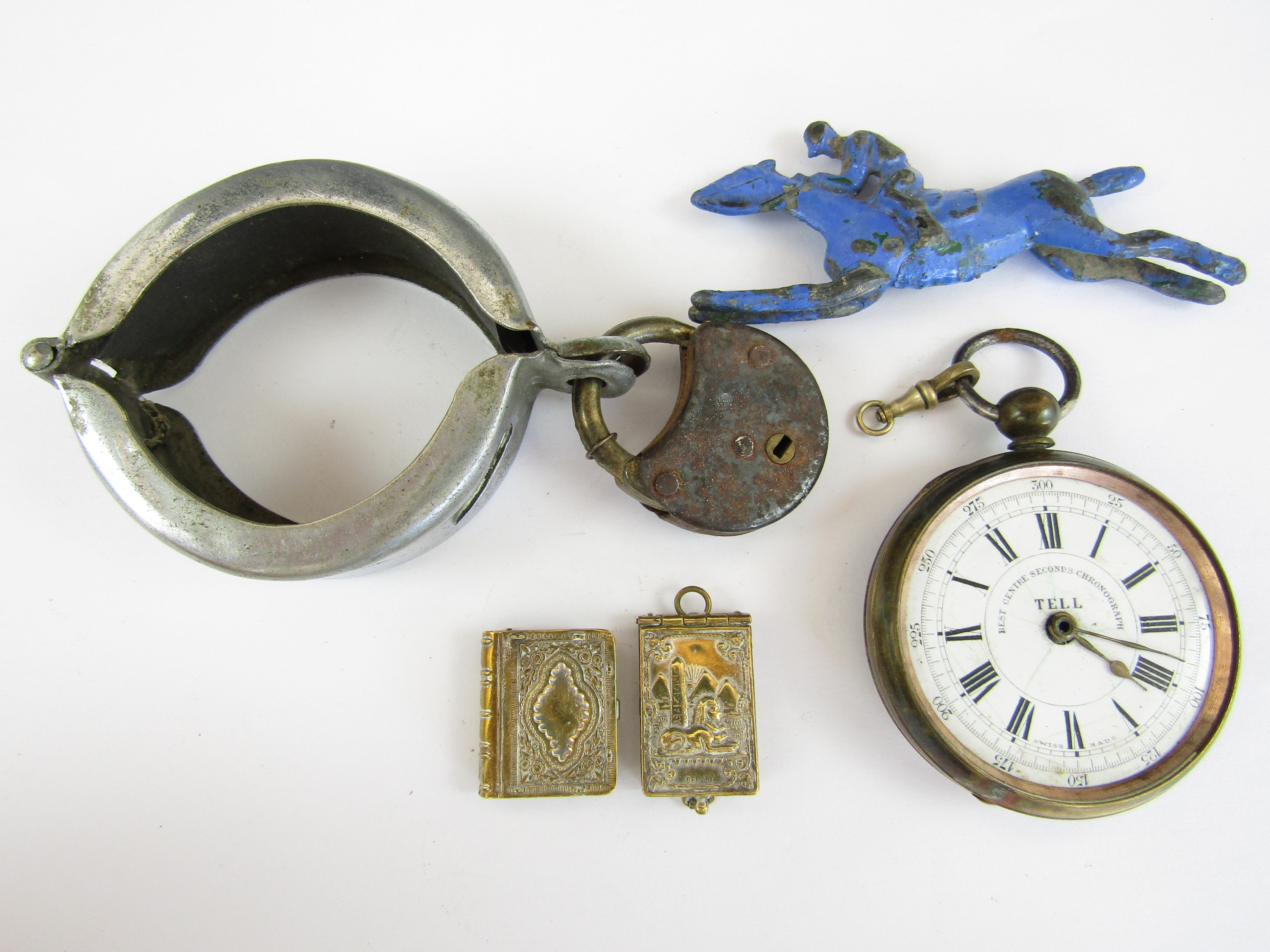A Tell pocket chronograph, together with two novelty brass fobs etc.