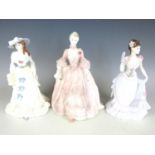 Three Wedgwood figurines from the Femmes Fatales series including Lillie Langtry, Emma Hamilton