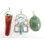 A contemporary carnelian and white metal pendant, together with one other blue stone and white metal