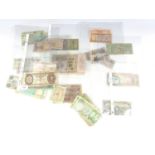 Iranian bank notes together with Japanese bank notes etc.