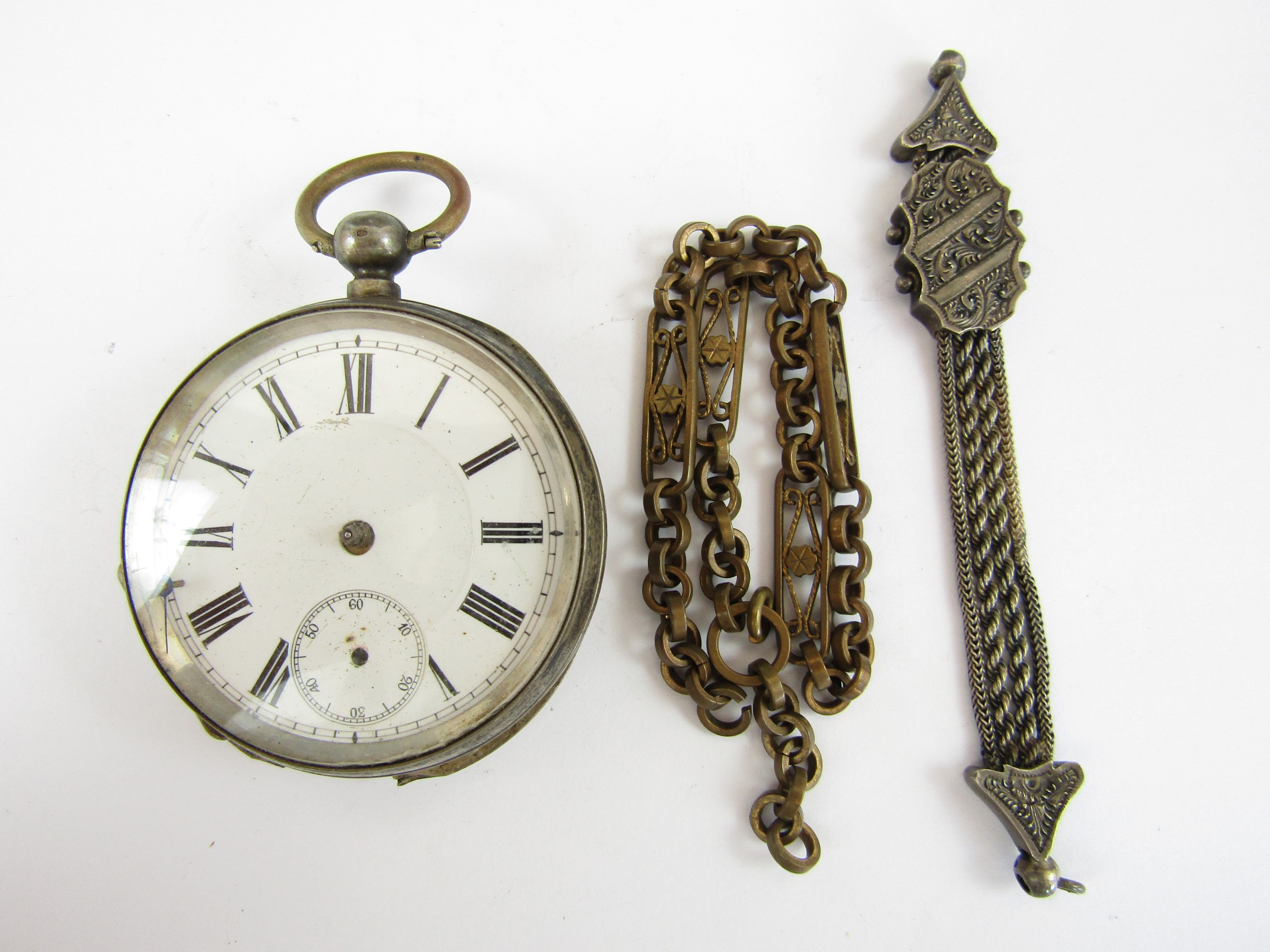 A late 19th Century gentleman's pocket watch, with a white enamelled face, Roman numerals and a