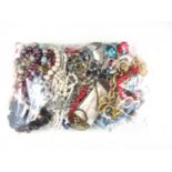 A large quantity of vintage costume jewellery, including bead and contemporary necklaces