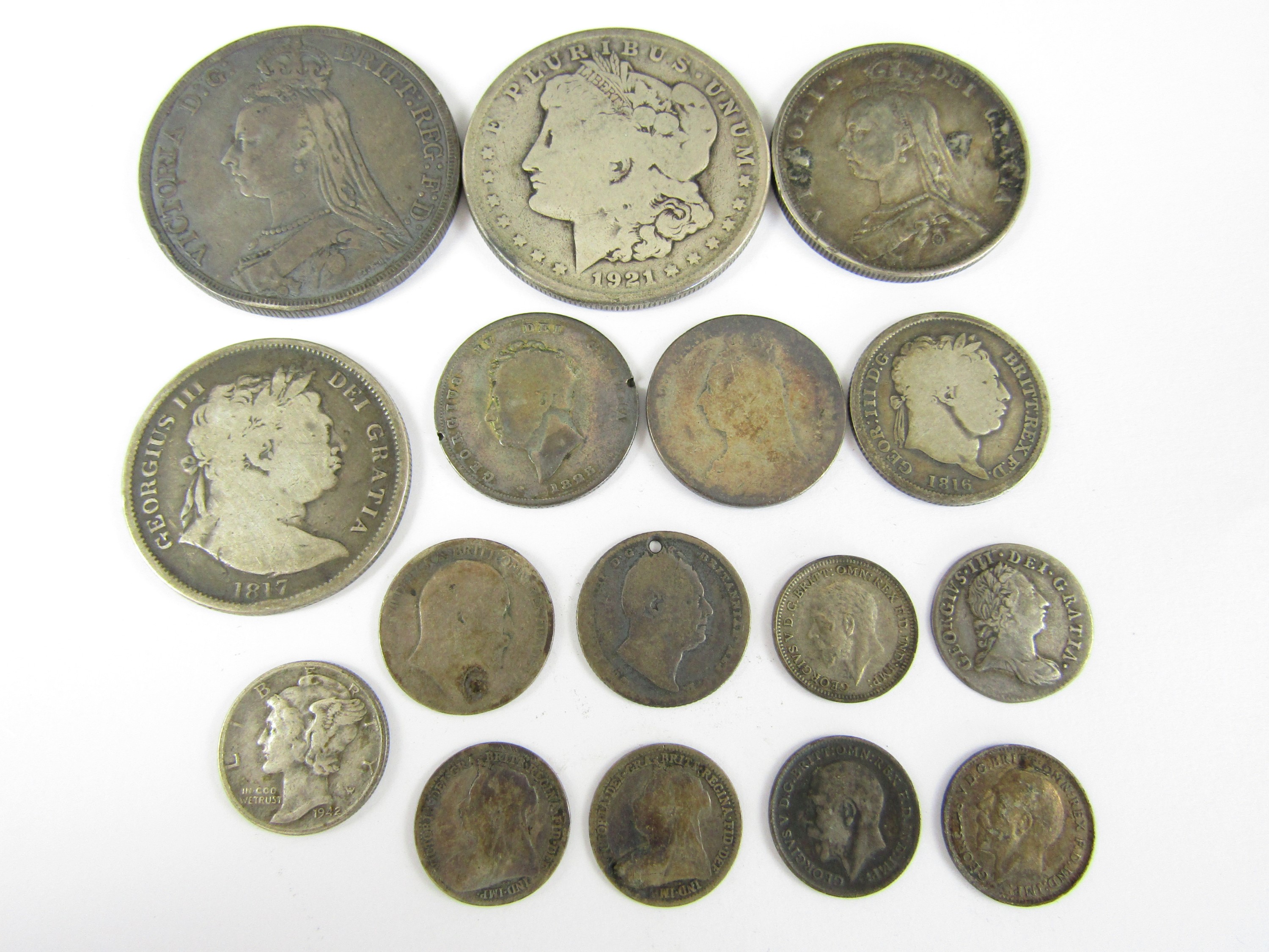 A quantity of largely 19th Century British silver coins and a 1921 US silver Dollar, 112 g total