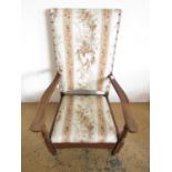 A 1920's oak low arm chair