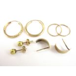 Contemporary 9ct gold half hoop stud earrings, together with two pairs of yellow metal hoop