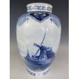 A Villeroy and Boch Delft oviform vase, 36 cm (a/f)